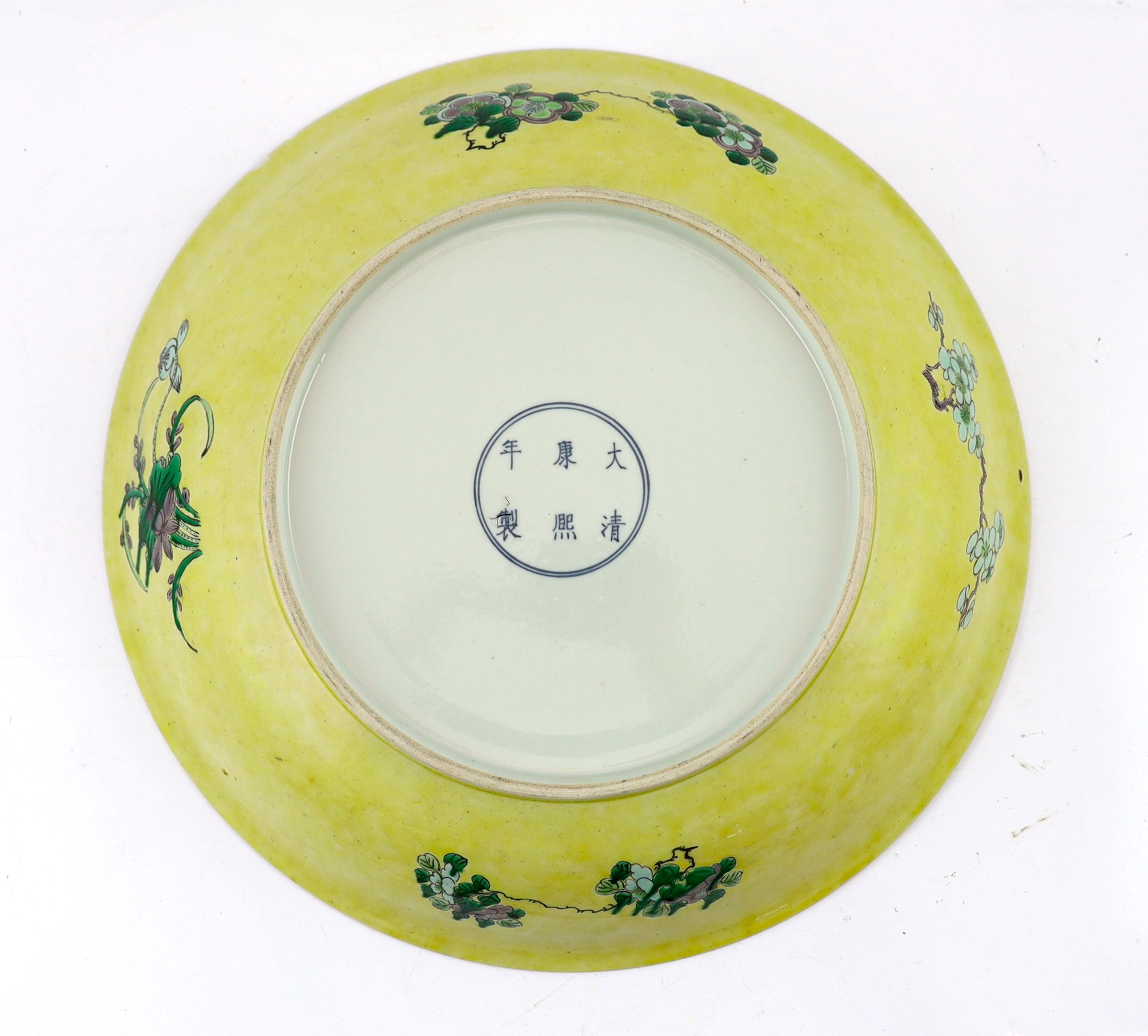 A Chinese enamelled porcelain 'dragon' dish, Kangxi mark but 19th century, small splinter rim chip, rim ground off